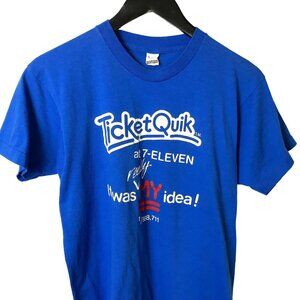 Vintage 80s 7-Eleven Ticket Quik T-Shirt M Blue Screen Stars Single Stitch Logo